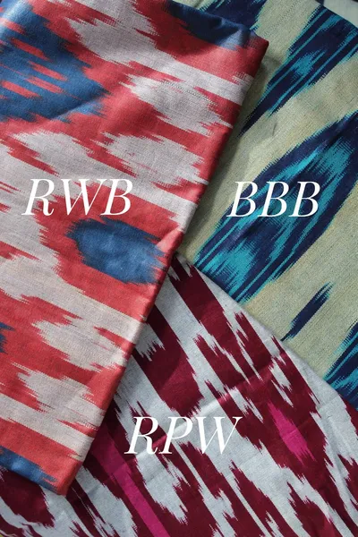 Ikat fabric swatches in red-white-blue, all-blue, and red-pink-white colorways